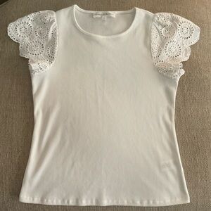 Chelsea & Theodore White Ruffled Eyelet short sleeve Blouse.